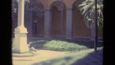 1962: middle area of two storey mixed color painted building and it is spacious