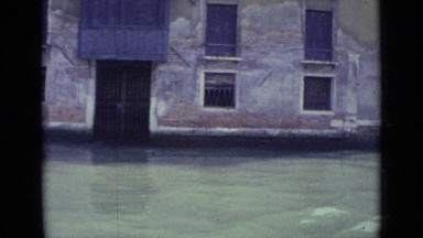 1962: buildings are flooded, view from road which looks like river now. VENICE