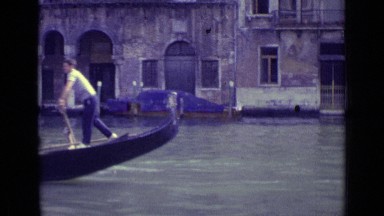 1962: boatman transporting people in his boat in venice VENICE ITALY