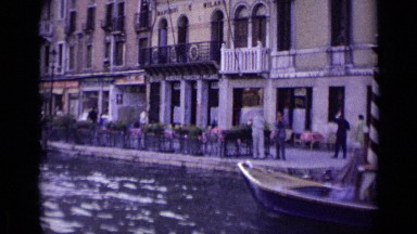 1962: the man was walking in platform, boat was standing and running in water