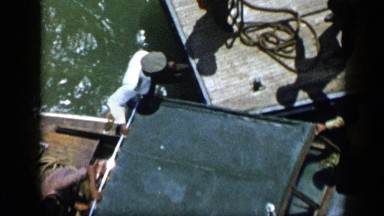 1959: Person Boarding Boat at Port in Venezuela