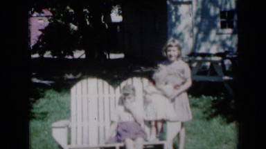 1961: the girl standing, another girl sitting