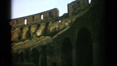 1962: an amazing and majestic arena with seats of spectators under clear sky