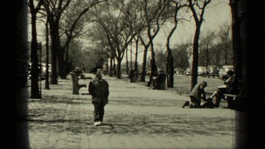 1949: Young Happy Boy Walking Alone Down Busy Street New York