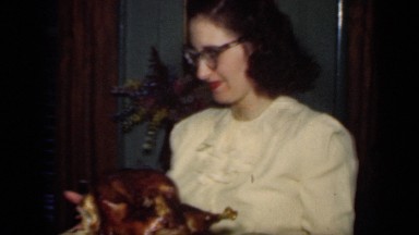 1949: the woman was serve food in dining table NEW YORK