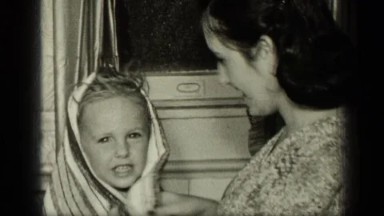 1957: Mother Covering Her Daughter With Towel After Bath New York