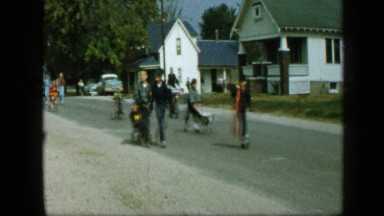 1959: people are walking on road with children at daytime ALEDO TEXAS