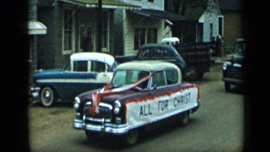 1959: back to person,there are some cars coming to slow ALEDO TEXAS