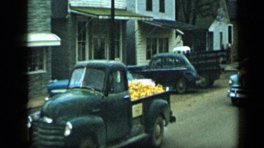 1959: group of cars in different color are movie in queue ALEDO TEXAS