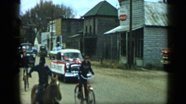 1959: countryside conducting parade in street ALEDO TEXAS