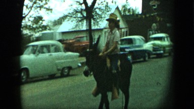 1959: boy is riding on horse, two are playing ring ALEDO TEXAS