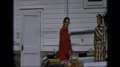 1959: two ladies chatting in backyard of their houses ALEDO TEXAS