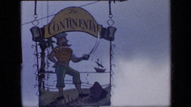 1959: hotel on roadside with boards and signs with artistic finish VENEZUELA