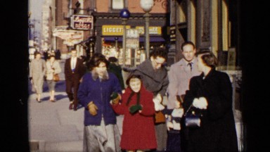 1948: happy family went to outside for shopping in city NEW YORK