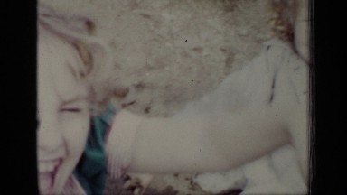 1948: funny cute children sitting on ground and smiling NEW YORK