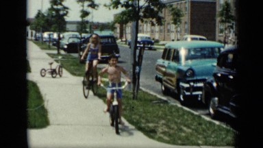 1948: children driving in pedestrian path NEW YORK