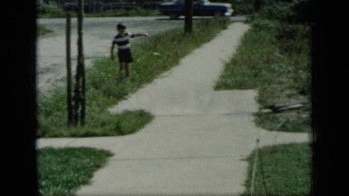1948: boy skating on street NEW YORK