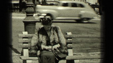 1949: well-dressed woman posing on bench NEW YORK