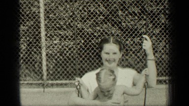 1949: mother and daughter playing in swing to go front and back NEW YORK