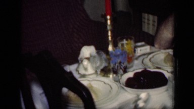 1949: two couples are sit on their dining table and drinking wine. NEW YORK