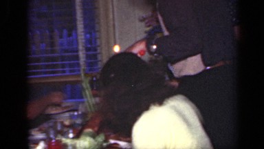 1949: family enjoying food in dining table NEW YORK