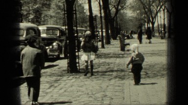 1949: child playing and running on footpath and enjoying day NEW YORK
