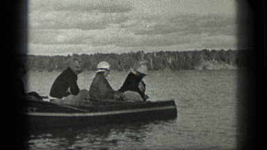 1939: A View of People Boating on Long Lake, Canada