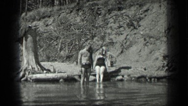 1939: husband and wife are going to take bath at the river