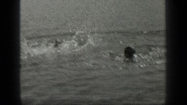 1939: Two People Playing in Water at Long Lake Canada