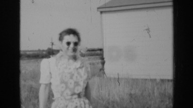 1947: man pumping the water hardly when morning ILLINOIS