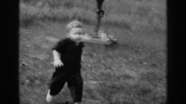 1947: a small boy running towards his home from an active borewell