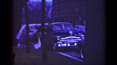 1947: the new wedding couple are standing near a car ILLINOIS
