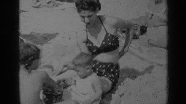 1947: the mother and her daughters sitting on the soil land NEW YORK