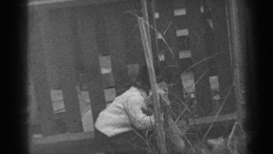 1947: small girl hold and hugs dog in black and white antique video NEW YORK