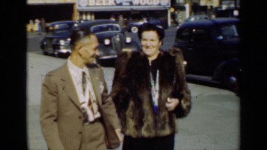 1947: man and woman walking down the street NEW YORK