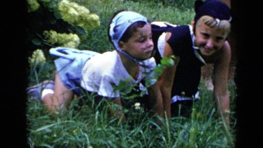 1948: two girls that are probably dressed up for halloween enjoying NEW YORK