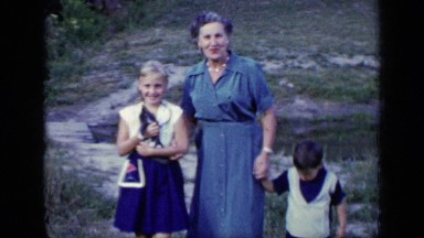 1948: the women and her beautiful children walking on the rocks NEW YORK