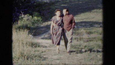1948: couple in love walk together in the park NEW YORK