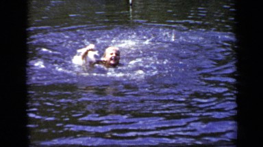 1948: child swimming NEW YORK