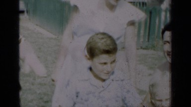 1950: A Family with Kids Posing in the Yard in New York