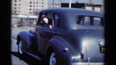 1950: the father and his daughter make a travel on their car NEW YORK