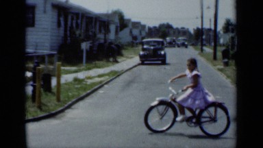 1950: girl riding in the cycle NEW YORK