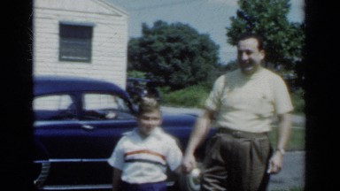 1950: a father and son walking hand in hand NEW YORK