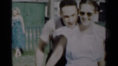1950: a couple madly in love and dancing at a get-together party with friends