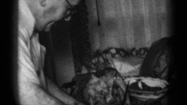 1950: cutting the chicken on the table for dinner occasion NEW YORK