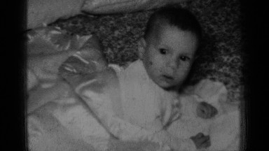 1950: baby waking from a nap. NEW YORK