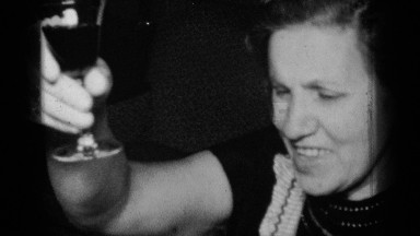 1950: a family enjoys a lively meal with each other and has fun together