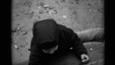 1950: footage of a kid that is playing and having fun while being somewhere