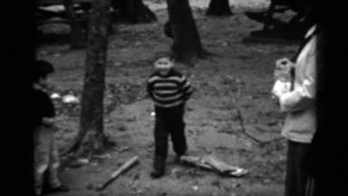 1950: kid that's probably a grandfather now, having fun with his peers NEW YORK