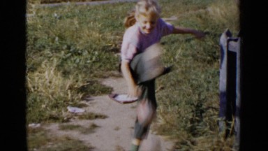 1951: girl playing NEW YORK
